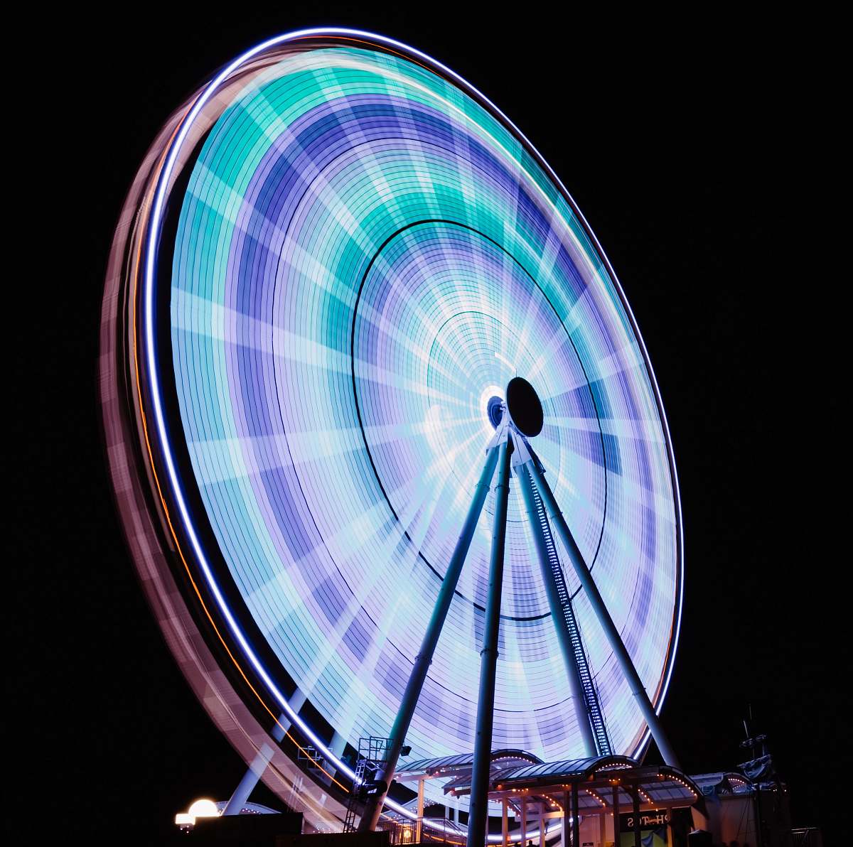 amusement park timelapse photography of ferris wheel leisure activities